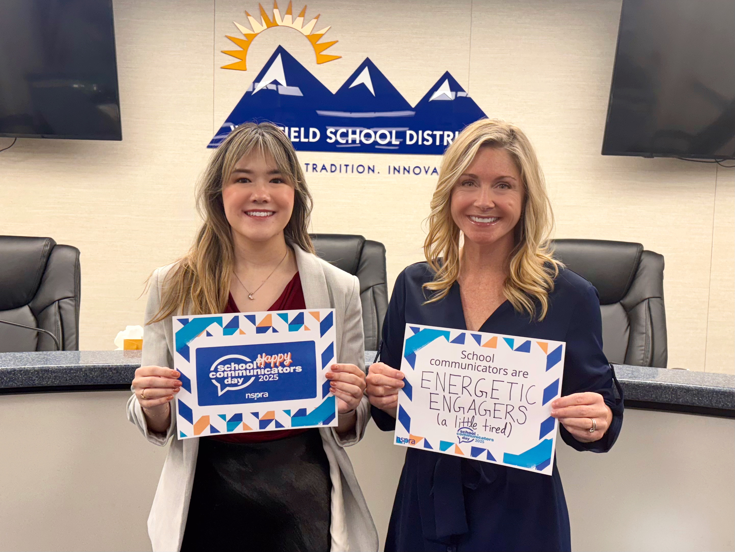 People holding up signs.